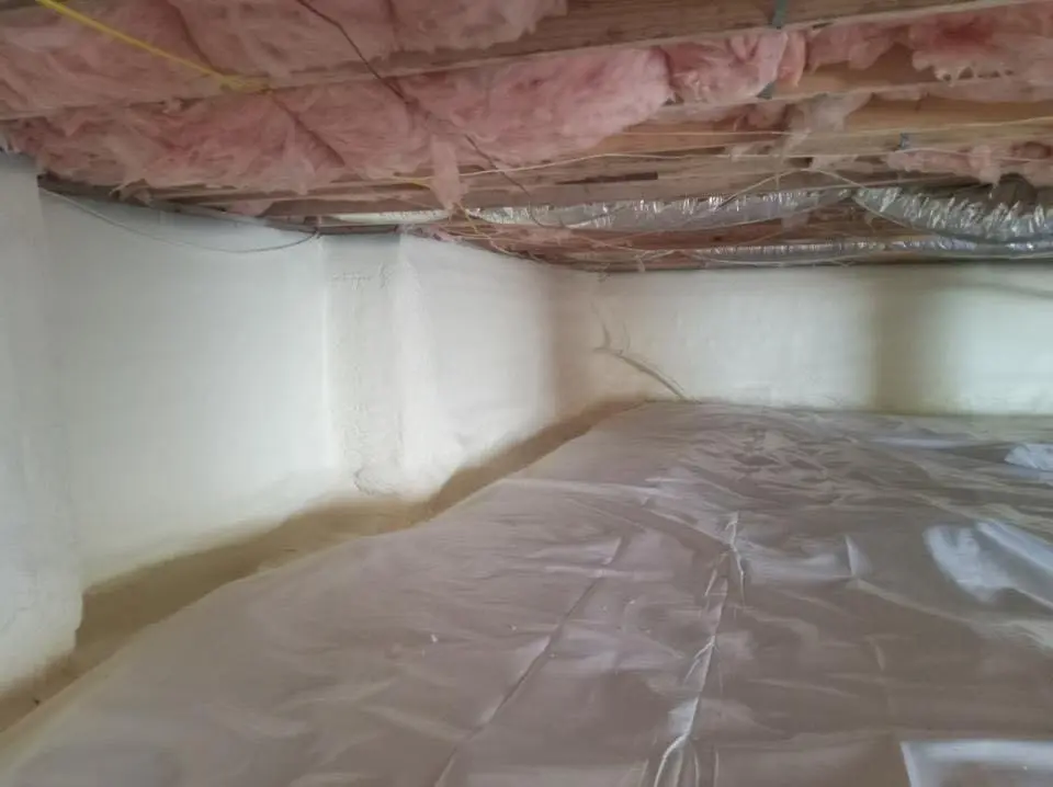 Crawl space encapsulation with closed-cell spray foam for Commercial Roof Restoration in Liberty Hill